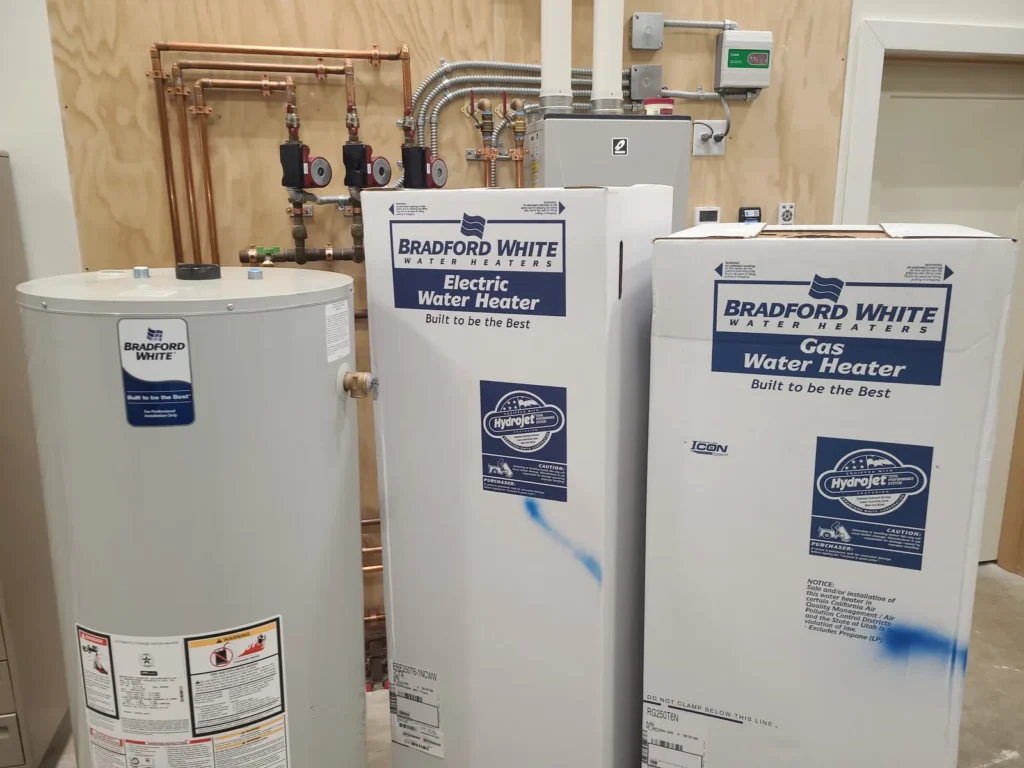 New Bradford White water heaters in a utility room