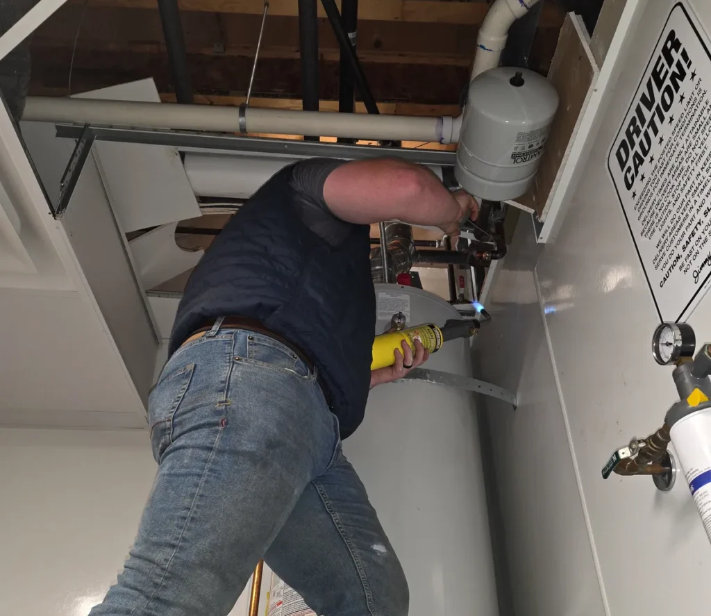 Speedy technician connecting a commercial water heater