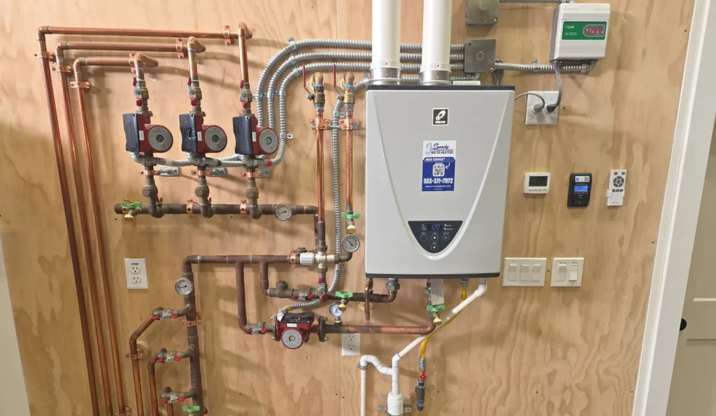 Tankless water heater installed with new copper plumbing connections