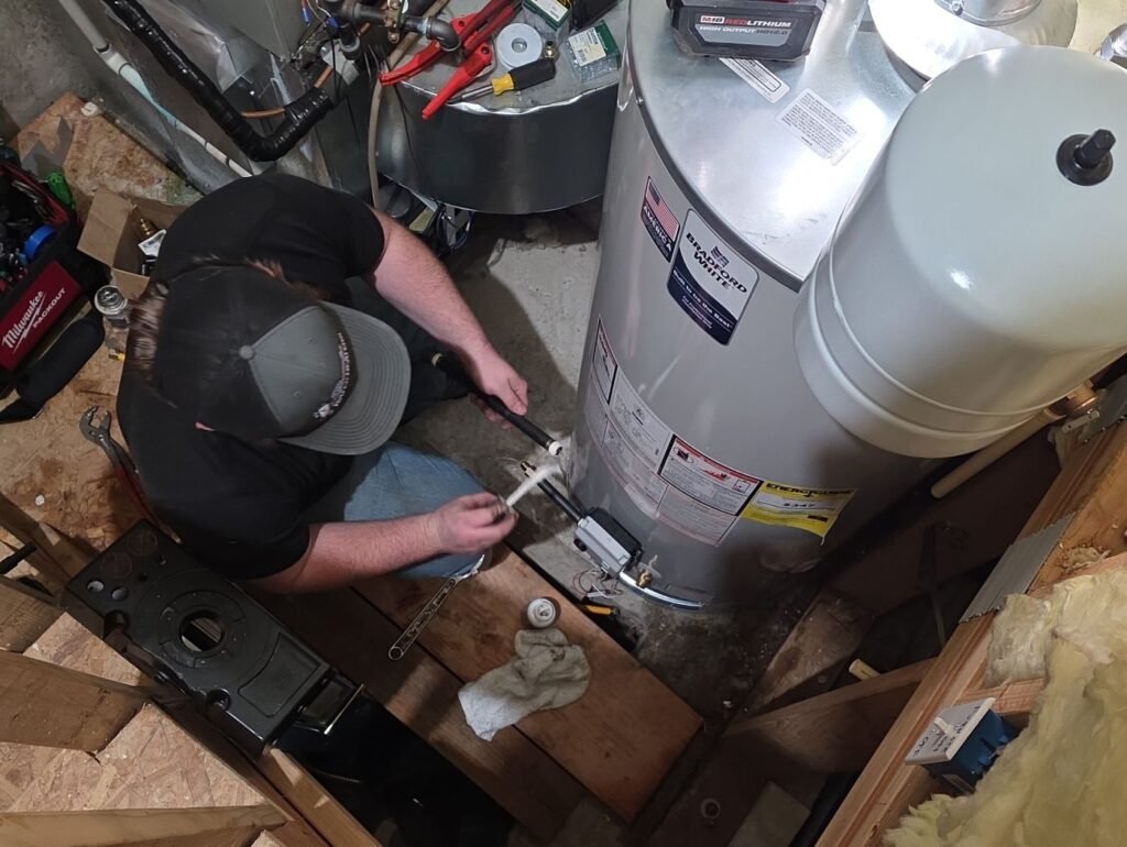 Speedy technician installing a commercial water heater