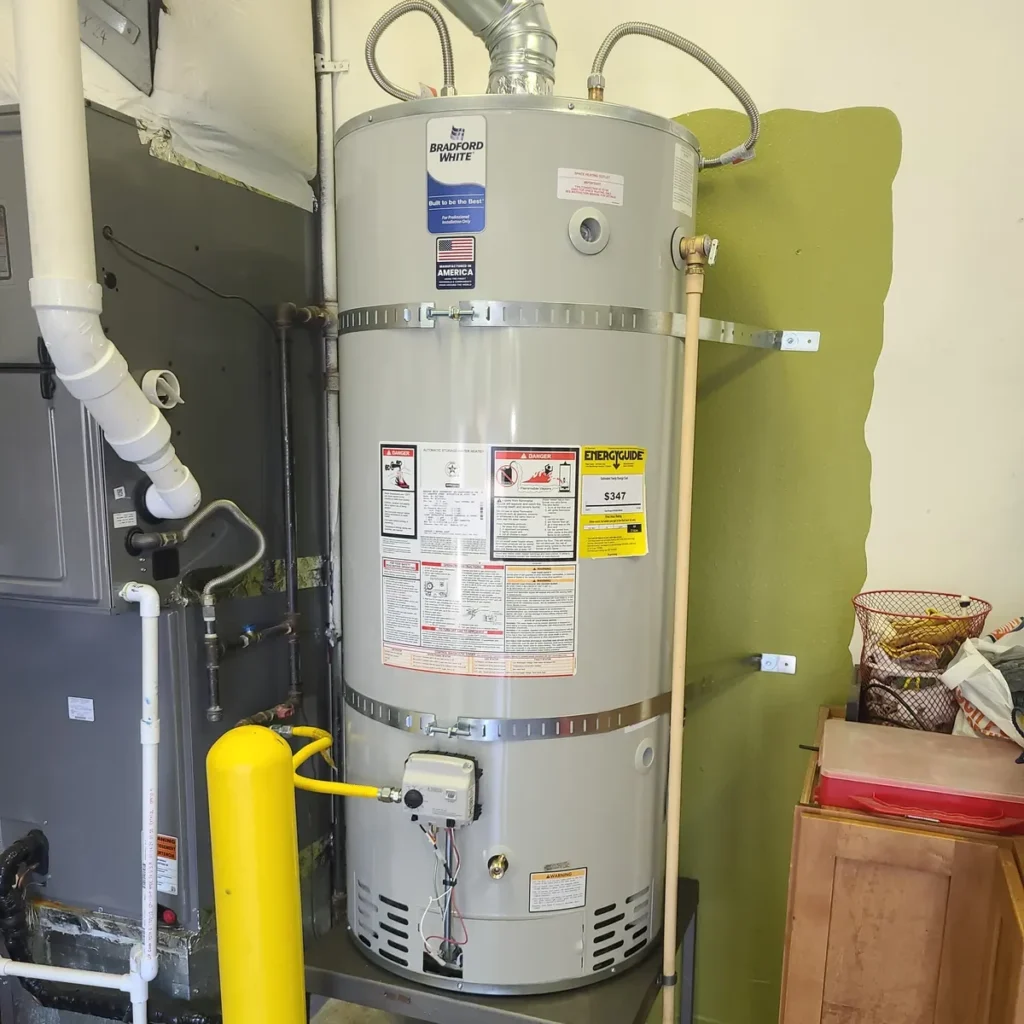 Gas water heater installed in a garage with new gas line