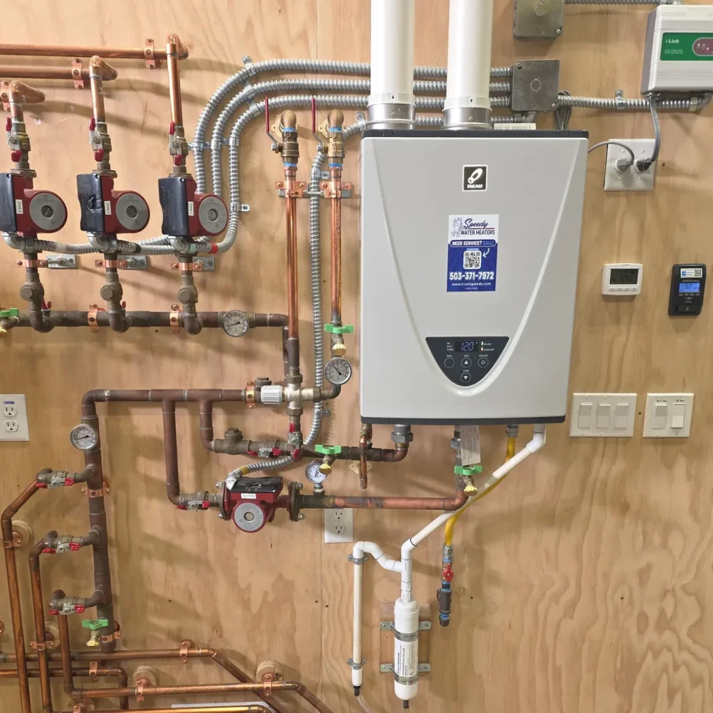 Tankless water heater installed with new copper plumbing connections